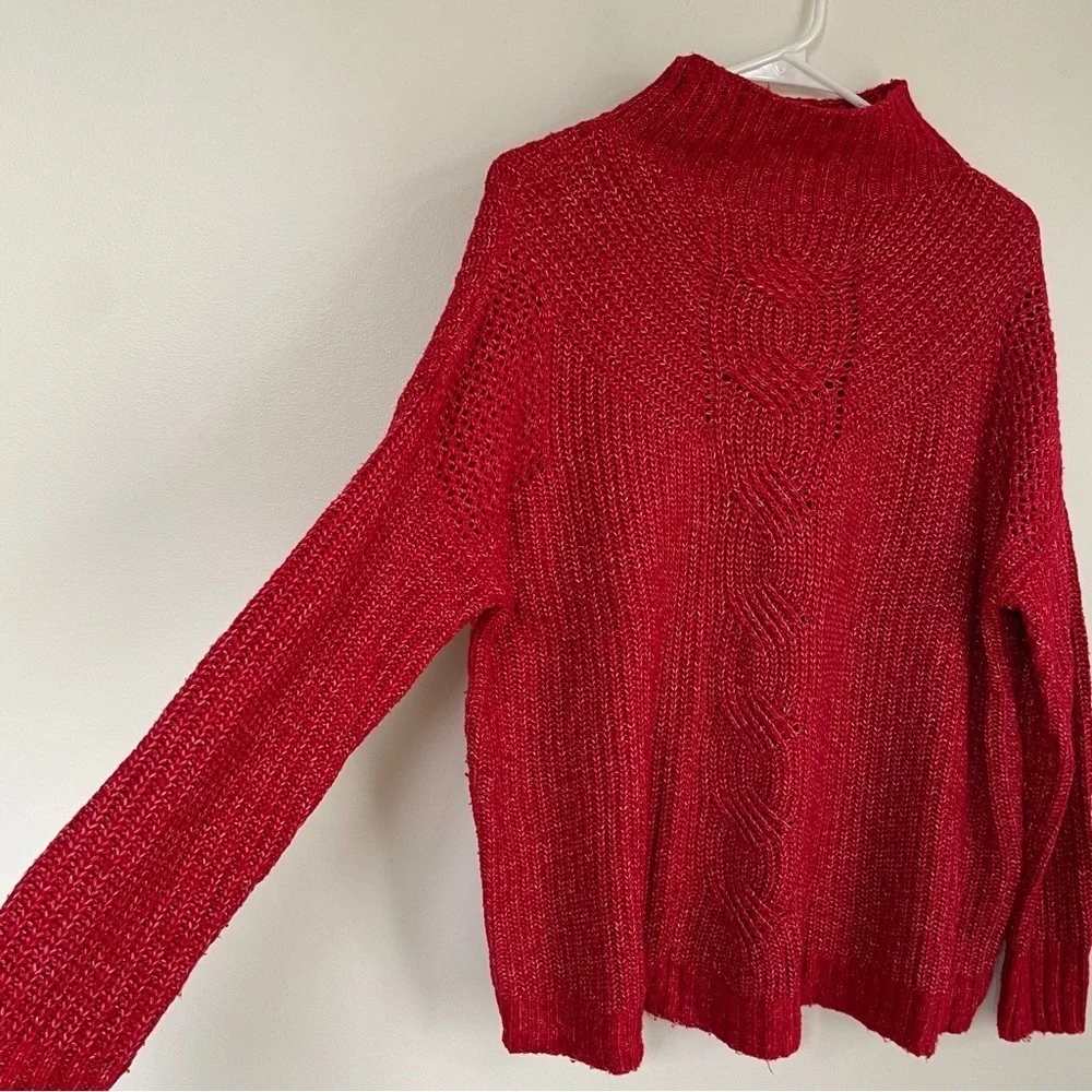 Maurice’s red sweater